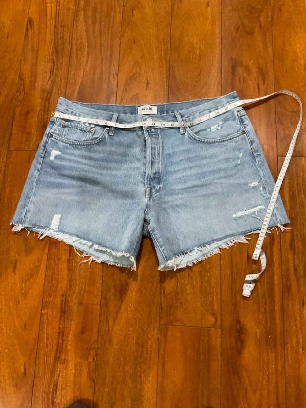 Agolde Light Wash Distressed Denim Shorts